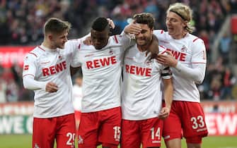 epa08138745 Cologne's Jonas Hector (2-R) celebrates scoring the third goal with Cologne's Jan Thielmann (L) Cologne's Jhon Cordoba (2-L) and Cologne's Sebastiaan Bornauw (R) during the German Bundesliga soccer match between 1.FC Koeln and VfL Wolfsburg in Cologne, Germany, 18 January 2020.  EPA/FRIEDEMANN VOGEL CONDITIONS - ATTENTION: The DFL regulations prohibit any use of photographs as image sequences and/or quasi-video.
