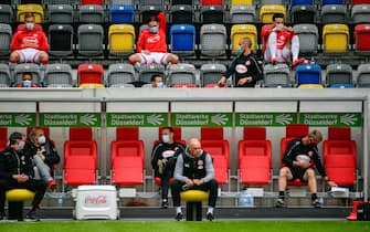 Fortuna Duesseldorf's German head coach Uwe Roesler sits on the sideline during the German first division Bundesliga football match Fortuna Dusseldorf v SC Paderborn on May 16, 2020 in Duesseldorf, western Germany as the season resumed following a two-month absence due to the novel coronavirus COVID-19 pandemic. (Photo by SASCHA SCHUERMANN / various sources / AFP) / DFL REGULATIONS PROHIBIT ANY USE OF PHOTOGRAPHS AS IMAGE SEQUENCES AND/OR QUASI-VIDEO (Photo by SASCHA SCHUERMANN/AFP via Getty Images)