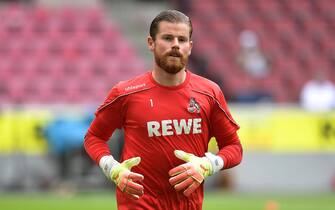 epa08482533 Timo Horn of 1. FC Koeln warms up prior to the Bundesliga match between 1. FC Koeln and 1. FC Union Berlin at RheinEnergieStadion in Cologne, Germany, 13 June 2020.  EPA/ALEXANDER SCHEUBER / POOL DFL regulations prohibit any use of photographs as image sequences and/or quasi-video.