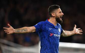 Chelsea's French striker Olivier Giroud gestures during the English Premier League football match between Chelsea and West Ham United at Stamford Bridge in London on November 30, 2019. (Photo by Ben STANSALL / AFP) / RESTRICTED TO EDITORIAL USE. No use with unauthorized audio, video, data, fixture lists, club/league logos or 'live' services. Online in-match use limited to 120 images. An additional 40 images may be used in extra time. No video emulation. Social media in-match use limited to 120 images. An additional 40 images may be used in extra time. No use in betting publications, games or single club/league/player publications. /  (Photo by BEN STANSALL/AFP via Getty Images)
