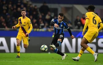 Inter Milan's Argentinian forward Lautaro Martinez shoots on goal during the UEFA Champions League Group F football match Inter Milan vs Barcelona on December 10, 2019 at the San Siro stadium in Milan. (Photo by Miguel MEDINA / AFP) (Photo by MIGUEL MEDINA/AFP via Getty Images)