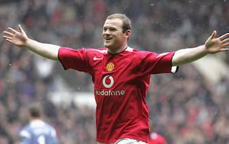 MANCHESTER, ENGLAND - MARCH 12: Wayne Rooney of Manchester United celebrates scoring the first goal during the Barclays Premiership match between Manchester United and Newcastle at Old Trafford on March 12 2006 in Manchester, England. (Photo by Tom Purslow/Manchester United via Getty Images)