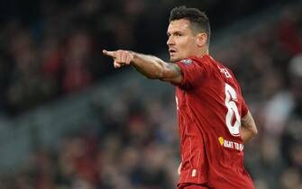 BRITAIN SOCCER UEFA CHAMPIONS LEAGUE epa08029812 Dejan Lovren of Liverpool celebrates after scoring the 1-1 during the UEFA Champions League Group E match between Liverpool and SSC Napoli in Liverpool, Britain, 27 November 2019. EPA/PETER POWELL