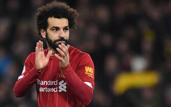 epaselect epa08260371 Mohamed Salah of Liverpool reacts at the end of the English Premier League match between Watford and Liverpool in Watford, Britain, 29 February 2020.  EPA/ANDY RAIN EDITORIAL USE ONLY. No use with unauthorized audio, video, data, fixture lists, club/league logos or 'live' services. Online in-match use limited to 120 images, no video emulation. No use in betting, games or single club/league/player publications