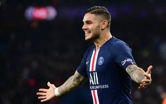 Paris Saint-Germain's Argentine forward Mauro Icardi celebrates after scoring his team's second goal during the French L1 football match between Paris Saint-Germain (PSG) and Olympique de Marseille (OM) at the Parc des Princes stadium in Paris on October 27, 2019. (Photo by Martin BUREAU / AFP) (Photo by MARTIN BUREAU/AFP via Getty Images)