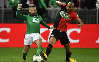 Rennes' French midfielder Steven Nzonzi (R) vies with Saint-Etienne's French midfielder  Yohan Cabaye (L) during the French Cup semi-final match between AS Saint-Etienne (ASSE) and Stade Rennais FC (Rennes) on March 5, 2020, at the Geoffroy Guichard stadium in Saint-Etienne, central France. (Photo by PHILIPPE DESMAZES / AFP) (Photo by PHILIPPE DESMAZES/AFP via Getty Images)