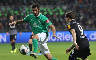 epa08019739 Bremenâs Nuri Sahin (L) in action against Schalke's Benito Raman  (R) during the German Bundesliga soccer match between SV Werder Bremen and FC Schalke 04 in Bremen, Germany, 23 November 2019.  EPA/FOCKE STRANGMANN CONDITIONS - ATTENTION: The DFL regulations prohibit any use of photographs as image sequences and/or quasi-video.