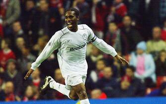 LIVERPOOL, ENGLAND - DECEMBER 3:  Jay Jay Okocha of Bolton celebrates after scoring the second goal with a free kick during the Carling Cup fourth round match between Liverpool and Bolton Wanderers at Anfield on December 3, 2003 in Liverpool, England.  (Photo by Michael Steele/Getty Images)     
