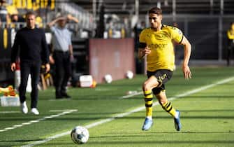 GERMANY SOCCER BUNDESLIGA epa08445889 Dortmund's Achraf Hakimi in action during the German Bundesliga soccer match between Borussia Dortmund and FC Bayern Munich at Signal Iduna Park in Dortmund, Germany, 26 May 2020. Bayern Munich won 1-0. EPA/FEDERICO GAMBARINI / POOL ATTENTION: The DFL regulations prohibit any use of photographs as image sequences and/or quasi-video.