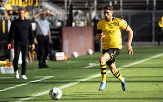 epa08445889 Dortmund's Achraf Hakimi in action during the German Bundesliga soccer match between Borussia Dortmund and FC Bayern Munich at Signal Iduna Park in Dortmund, Germany, 26 May 2020. Bayern Munich won 1-0.  EPA/FEDERICO GAMBARINI / POOL ATTENTION: The DFL regulations prohibit any use of photographs as image sequences and/or quasi-video.