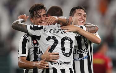 Turin, Italy, 14th August 2021. Federico Bernardeschi of Juventus celebrates with team mates Paulo Dybala and Federico Chiesa after scoring to give the side a 2-1 lead during the Pre Season Friendly match at Allianz Stadium, Turin. Picture credit should read: Jonathan Moscrop / Sportimage via PA Images