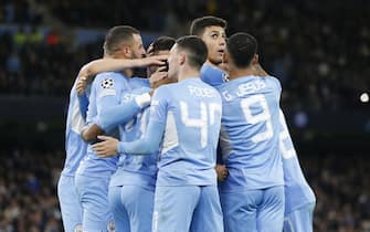 epa09562339 Players of Manchester City celebrate their 3-1 lead during the UEFA Champions League group A soccer match between Manchester City and Club Brugge in Manchester, Britain, 03 November 2021.  EPA/MAGI HAROUN