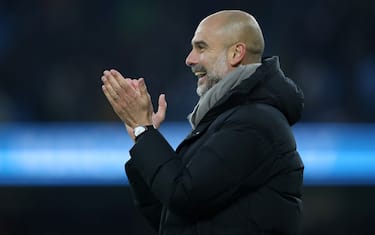 MANCHESTER, ENGLAND - NOVEMBER 28: Pep Guardiola, Manager of Manchester City smiles prior to the Premier League match between Manchester City and West Ham United at Etihad Stadium on November 28, 2021 in Manchester, England. (Photo by Manchester City FC/Manchester City FC via Getty Images)