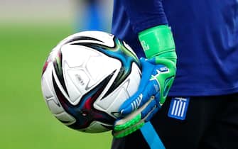 Odisseas Vlachodimos  of Greece glove and match ball detail ahead of the 2022 FIFA World Cup Qualifiers Group B match at Olympic Stadium, AthensPicture by Yannis Halas/Focus Images/Sipa USA 14/11/2021