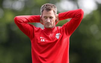 POTSDAM, GERMANY - MAY 24: Head coach Alexander Blessin of RB Leipzig U19 looks on during a training session at Karl-Liebknecht-Stadion on May 24, 2019 in Potsdam, Germany.  (Photo by Ronny Hartmann/Bongarts/Getty Images)