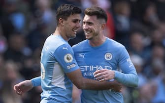 MANCHESTER, ENGLAND - APRIL 23: Rodri of Manchester City celebrates scoring with team mate Aymeric Laporte during the Premier League match between Manchester City and Watford at Etihad Stadium on April 23, 2022 in Manchester, United Kingdom. (Photo by Visionhaus/Getty Images)