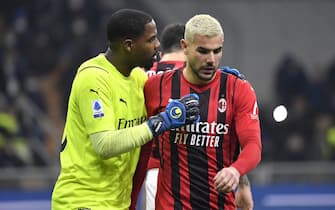 SAN SIRO STADIUM, MILANO, ITALY - 2022/02/05: Mike Maignan talks to Theo Hernandez of AC Milan during the Serie A football match between FC Internazionale and AC Milan. AC Milan won 2-1 over FC Internazionale. (Photo by Andrea Staccioli/Insidefoto/LightRocket via Getty Images)