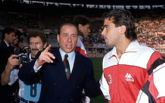 AC Milan President Silvio Berlusconi talks to Stefano Borgonovo of AC Milan after the Serie A 1990, Italy. (Photo by Alessandro Sabattini/Getty Images)