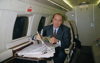 Wealthy Italian businessman Silvio Berlusconi boards his private plane before leaving Paris for Milan. In 1994, Berlusconi served briefly as Italian prime minister until he was ousted after being charged with bribing judges during a 1986 business deal. | Location: Seine St.-Denis, France. (Photo by THIERRY ORBAN/Sygma via Getty Images)