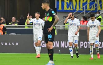 Empoli's Albanian midfielder Kristjan Asllani (L) celebrates after scoring  during the Italian Serie A football match between Inter and Empoli on May 6, 2022 at the San Siro stadium in Milan. (Photo by MIGUEL MEDINA / AFP) (Photo by MIGUEL MEDINA/AFP via Getty Images)