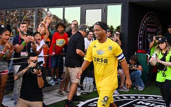 Brazilian football player Ronaldinho arrives for "The Beautiful Game" a celebrity football match at DRV PNK stadium in Fort Lauderdale, Florida on June 18, 2022. (Photo by CHANDAN KHANNA / AFP) (Photo by CHANDAN KHANNA/AFP via Getty Images)