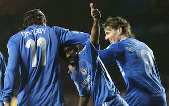 UNITED KINGDOM - DECEMBER 05:  Chelsea's Shaun Wright-Phillips, center, celebrates his goal besides Didier Drogba, left, and Khalid Boulahrouz during his sides' Group A Uefa Champions League match against Levski Sofia at Stamford Bridge stadium in London, December 5, 2006. Chelsea won 2-0 to progress to the knockout stages of the competition.  (Photo by Js Ghatora/Bloomberg via Getty Images)