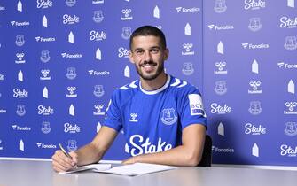 HALEWOOD, ENGLAND - AUGUST 08: (EXCLUSIVE COVERAGE) Conor Coady poses for a photograph after signing for Everton at Finch Farm on August 08 2022 in Halewood, England.  (Photo by Tony McArdle/Everton FC via Getty Images)