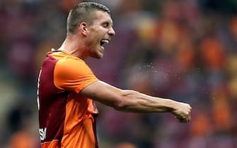 epa04870131 Galatasaray's  Lukas Podolski  reacts  during the friendly match between Galatasaray and Inter Milan at Turk Telekom Stadium in Istanbul, Turkey, 02 August 2015.  EPA/SEDAT SUNA