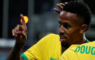 epa09306929 Brazil's Eder Militao celebrates after scoring against Ecuador, during a match for Group B of the Copa America 2021 at the Pedro Ludovico Teixeira Olympic Stadium in Goiania, Brazil, 27 June 2021.  EPA/Alberto Valdes