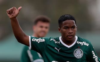 epa09934638 Midfielder Endrick, 15, plays a game as a starter for Palmeiras in Guarulhos, Brazil, 08 May 2022. Endrick, one of the strongest new promises in Brazilian football, continues to accumulate experience for his long-awaited debut in the Palmeiras professional squad and he was once again a starter with the 'Verdao' sub'20 team. Before the debut, which should happen after he turns 16 at the end of July and signs a professional contract, the local and foreign sports press and the eager Palmeiras fans have to settle for these performances. Before the gaze of several foreign media, Endrick started in the 5-1 win over Sao Jose in the Paulista Sub'20 Championship.  EPA/Fernando Bizerra