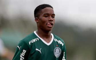 epa09934635 Midfielder Endrick, 15, plays a game as a starter for Palmeiras in Guarulhos, Brazil, 08 May 2022. Endrick, one of the strongest new promises in Brazilian football, continues to accumulate experience for his long-awaited debut in the Palmeiras professional squad and he was once again a starter with the 'Verdao' sub'20 team. Before the debut, which should happen after he turns 16 at the end of July and signs a professional contract, the local and foreign sports press and the eager Palmeiras fans have to settle for these performances. Before the gaze of several foreign media, Endrick started in the 5-1 win over Sao Jose in the Paulista Sub'20 Championship.  EPA/Fernando Bizerra