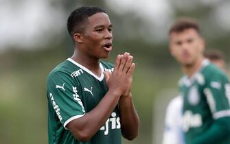 epa09934640 Midfielder Endrick, 15, plays a game as a starter for Palmeiras in Guarulhos, Brazil, 08 May 2022. Endrick, one of the strongest new promises in Brazilian football, continues to accumulate experience for his long-awaited debut in the Palmeiras professional squad and he was once again a starter with the 'Verdao' sub'20 team. Before the debut, which should happen after he turns 16 at the end of July and signs a professional contract, the local and foreign sports press and the eager Palmeiras fans have to settle for these performances. Before the gaze of several foreign media, Endrick started in the 5-1 win over Sao Jose in the Paulista Sub'20 Championship.  EPA/Fernando Bizerra