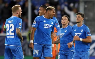 epa07114818 Hoffenheim's Joelinton (2-L) celebrates with his teammates after scoring the 3-3 equalizer during the UEFA Champions League Group F round match between TSG 1899 Hoffenheim and Olympique Lyonnais in Sinsheim, Germany, 23 October 2018.  EPA/RONALD WITTEK