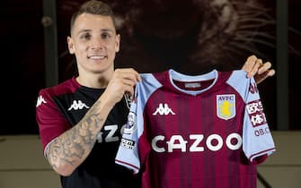 BIRMINGHAM, ENGLAND - JANUARY 13: New signing Lucas Digne of Aston Villa poses for a picture at Bodymoor Heath training ground on January 13, 2022 in Birmingham, England. (Photo by Neville Williams/Aston Villa FC via Getty Images)