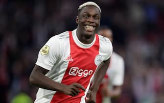 AMSTERDAM, NETHERLANDS - SEPTEMBER 18: Mohamed Daramy of Ajax celebrating his goal during the Dutch Eredivisie match between Ajax and SC Cambuur at Johan Cruijff ArenA on September 18, 2021 in Amsterdam, Netherlands. (Photo by Broer van den Boom/BSR Agency/Getty Images)