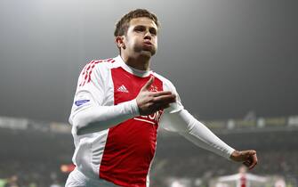 Ajax Amsterdam's Miralem Sulejmani celebrates after scoroing a goal during the league match Heracles Almelo against Ajax  on October 30 2010. AFP PHOTO/ANP/VINCENT JANNINK netherlands out - belgium out (Photo credit should read VINCENT JANNINK/AFP via Getty Images)