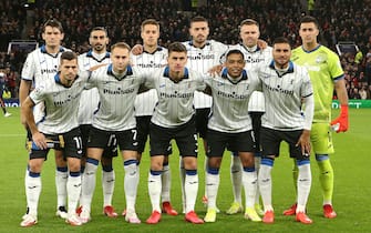 MANCHESTER, ENGLAND - OCTOBER 20: Players of Atalanta line up prior to the UEFA Champions League group F match between Manchester United and Atalanta at Old Trafford on October 20, 2021 in Manchester, England. (Photo by Charlotte Tattersall - UEFA/UEFA via Getty Images)
