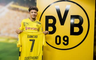 DORTMUND, GERMANY - AUGUST 31:  Jadon Sancho signs a new contract with Borussia Dortmund on August 31, 2017 in Dortmund, Germany.  (Photo by Alexandre Simoes/Borussia Dortmund via Getty Images)