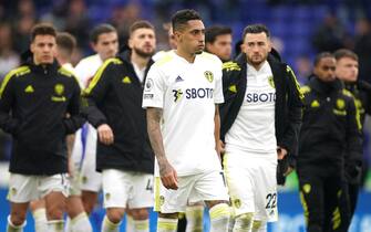 Leeds United's Raphinha (centre) and players look dejected after defeat in the Premier League match at the King Power Stadium, Leicester. Picture date: Saturday March 5, 2022.
