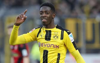 epa05814636 Dortmund's Ousmane Dembele reacts during the German Bundesliga soccer match between SC Freiburg and Borussia Dortmund in Freiburg, Germany, 25 February 2017.  EPA/RONALD WITTEK (EMBARGO CONDITIONS - ATTENTION: Due to the accreditation guidelines, the DFL only permits the publication and utilisation of up to 15 pictures per match on the internet and in online media during the match.)