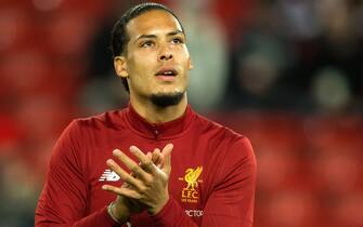 BRITAIN SOCCER FA CUP epa06419080 Liverpoolâs Virgil van Dijk warms up before the English FA Cup third round soccer match between Liverpool and Everton held at the Anfield, Liverpool, Britain, 05 January 2018. EPA/PETER POWELL EDITORIAL USE ONLY. No use with unauthorized audio, video, data, fixture lists, club/league logos or 'live' services. Online in-match use limited to 75 images, no video emulation. No use in betting, games or single club/league/player publications.