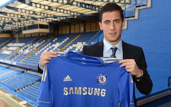 Eden Hazard poses with a team shirt after agreeing terms with Chelsea FC  (Photo by Darren Walsh/Chelsea FC via Getty Images)