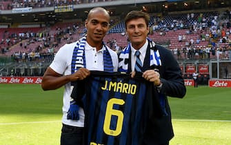 MILAN, ITALY - AUGUST 28:  Joao Mario of FC Internazionale (L) and Javier Zanetti pose for a photo prior to the Serie A match between FC Internazionale and US Citta di Palermo at Stadio Giuseppe Meazza on August 28, 2016 in Milan, Italy.  (Photo by Claudio Villa - Inter/FC Internazionale via Getty Images)