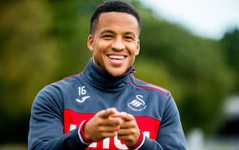 SWANSEA, WALES - SEPTEMBER 13:Martin Olsson  reacts to the camera  during the Swansea City training session at The Fairwood training Ground on September 13, 2017 in Swansea, Wales. (Photo by Athena Pictures/Getty Images)