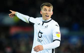 SWANSEA, WALES - NOVEMBER 29: Tom Carroll of Swansea City during the Sky Bet Championship match between Swansea City and Fulham at the Liberty Stadium on November 29, 2019 in Swansea, Wales. (Photo by Athena Pictures/Getty Images)