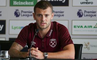 West Ham United's English midfielder Jack Wilshere attends a press conference at the unveiling of the club's new manager and newly signed players, at The London Stadium in east London on July 24, 2018. - West Ham United manager Manuel Pellegrini believes the London club's record signing, Felipe Anderson, will give his team a "new dimension". (Photo by Daniel LEAL / AFP) (Photo by DANIEL LEAL/AFP via Getty Images)