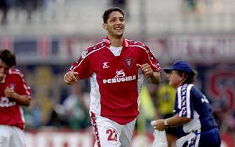 18 Sep 1999:  Marco Materazzi of Perugia celebrates his goal during the Italian Serie A match between Perugia and Cagliari played at the Stadio Renato Curi, Perugia, Italy. The game finished in a 3-0 win for Perugia. \ Mandatory Credit: Claudio Villa /Allsport