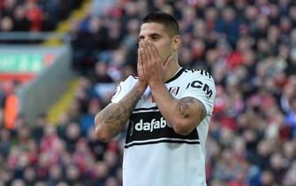 epa07158132 Fulham's Aleksandar Mitrovic reacts after his goal to be ruled offside during the English Premier League soccer match between Liverpool and Fulham at the Anfield in Liverpool, Britain, 11 November 2018.  EPA/PETER POWELL EDITORIAL USE ONLY. No use with unauthorized audio, video, data, fixture lists, club/league logos or 'live' services. Online in-match use limited to 75 images, no video emulation. No use in betting, games or single club/league/player publications