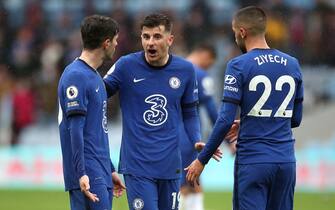 Chelsea's Mason Mount (centre) in discussion with Christian Pulisic (left) and Hakim Ziyech after the final whistle during the Premier League match at Villa Park, Birmingham. Picture date: Sunday May 23, 2021.