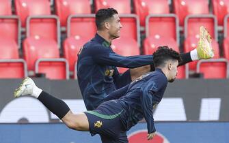 epa10201819 Portuguese players Cristiano Ronaldo (back) and Vitinha (front) attend their team's training session in Prague, Czech Republic, 23 September 2022. Portugal will face the Czech Republic in their UEFA Nations League soccer match on 24 September 2022.  EPA/MIGUEL A. LOPES